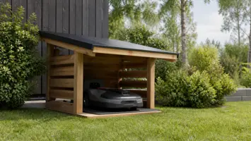 Garage till robotgräsklippare illustrert som tillbehör hos Robotgräsklippartest.se